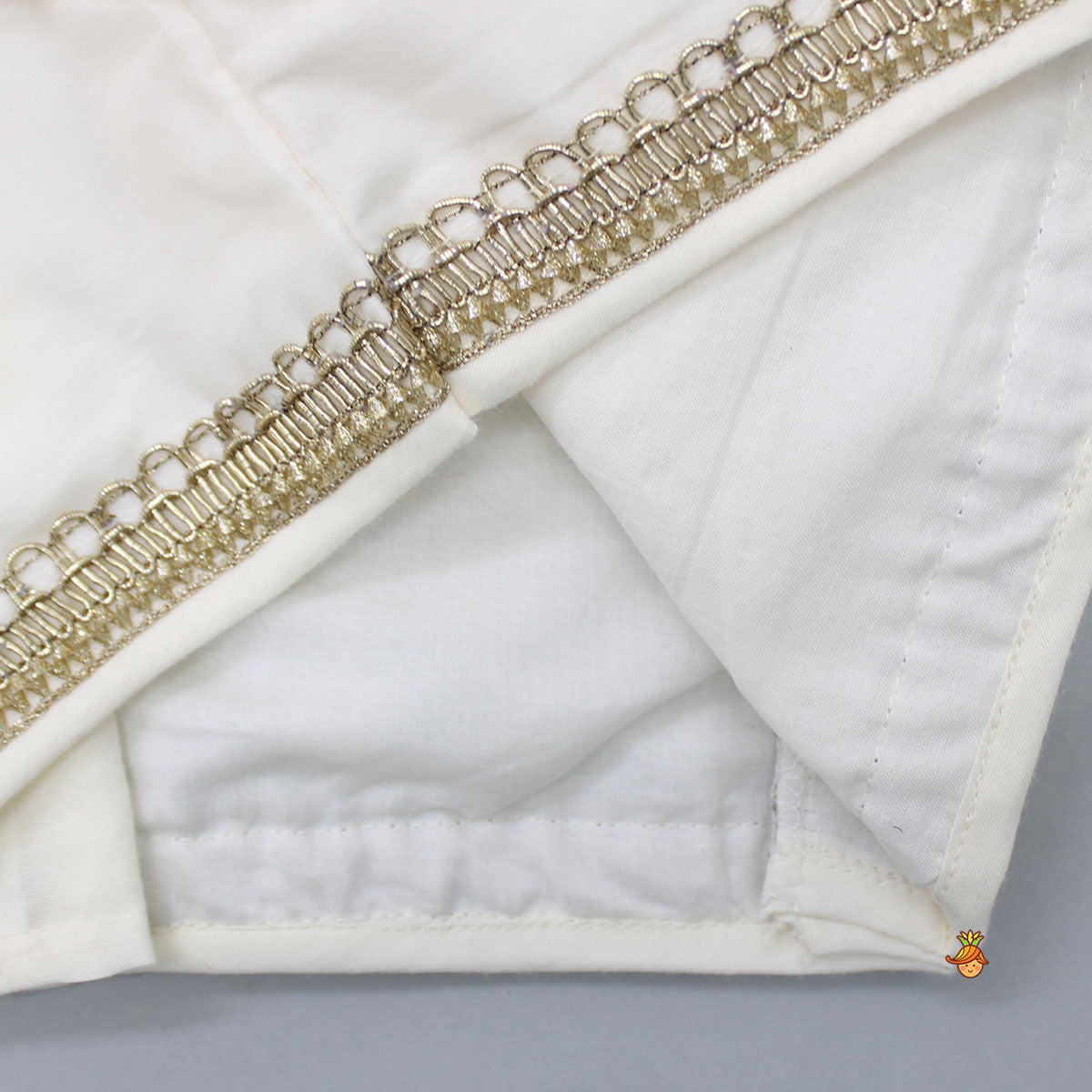Organza Off White Frilly Top And Chanderi Embroidered Lehenga