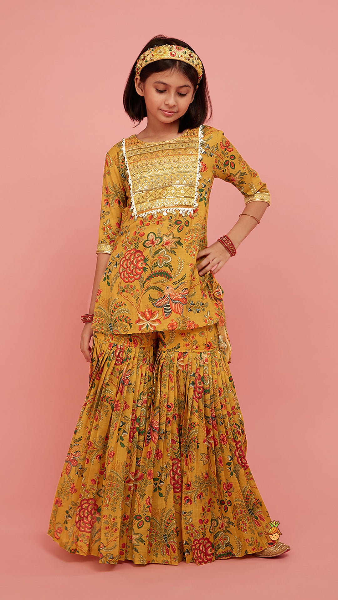 Intricate Yoke Gota Embroidered Mustard Printed Kurti And Pleated Sharara With Organza Sequined Dupatta