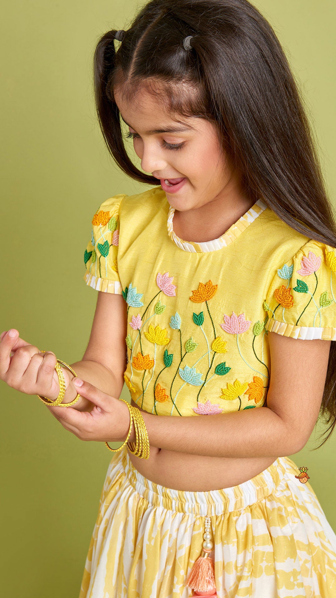 Beaded Yellow Top And Shibori Printed Lehenga With Ruffle Dupatta
