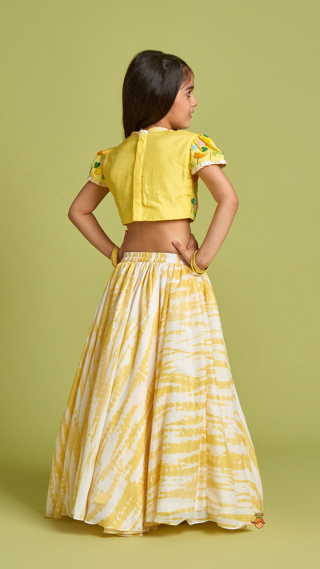 Beaded Yellow Top And Shibori Printed Lehenga With Ruffle Dupatta