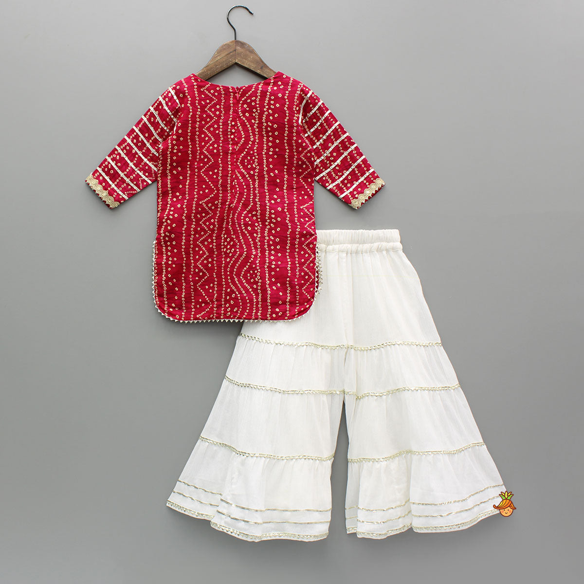 Bandhani Printed Pink Kurti With Off-White Sharara And Net Dupatta