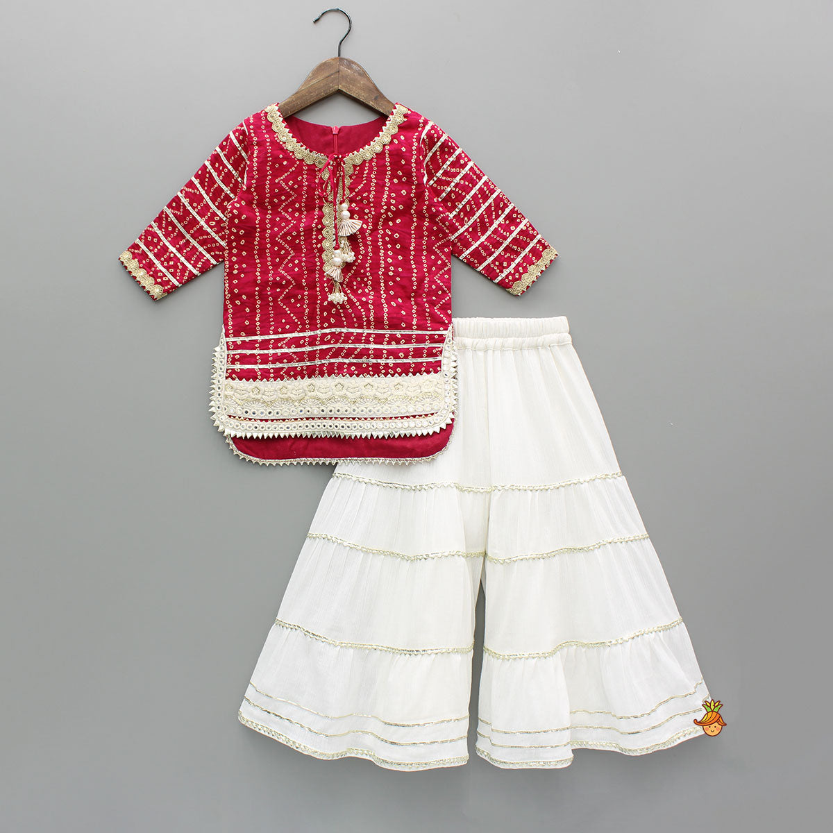 Bandhani Printed Pink Kurti With Off-White Sharara And Net Dupatta