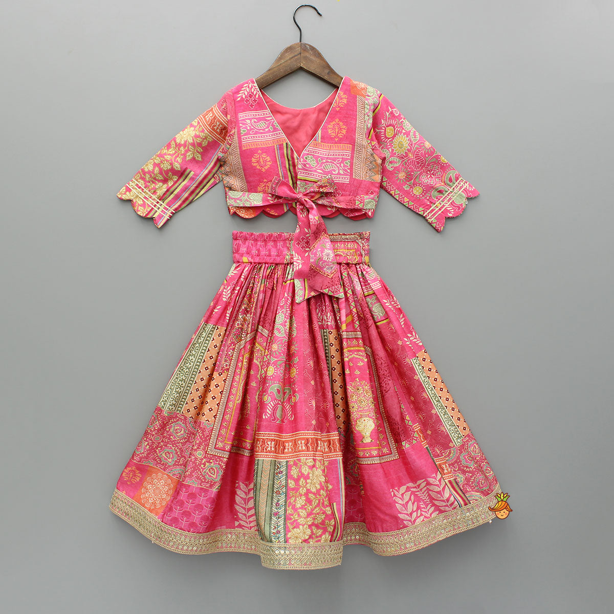 Stunning Pink Raw Silk Scalloped Top And Pearly Tassels Enhanced Lehenga