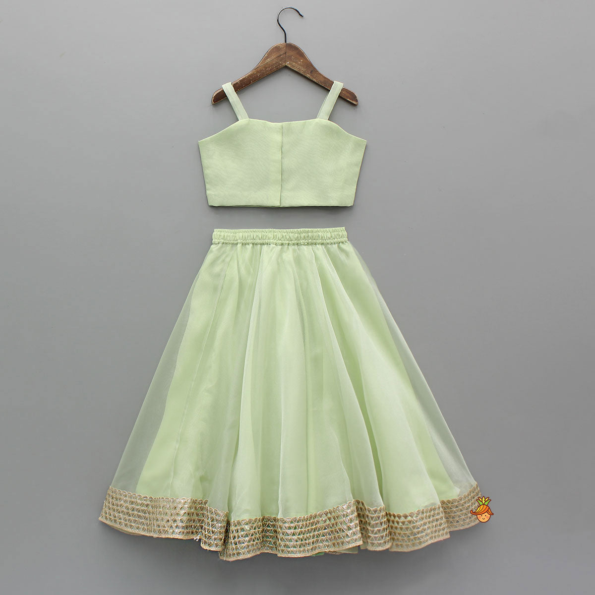 Floral Embroidered Green Sleeveless Top And Fabric Flower Tassels Adorned Lehenga With Ruffle Dupatta