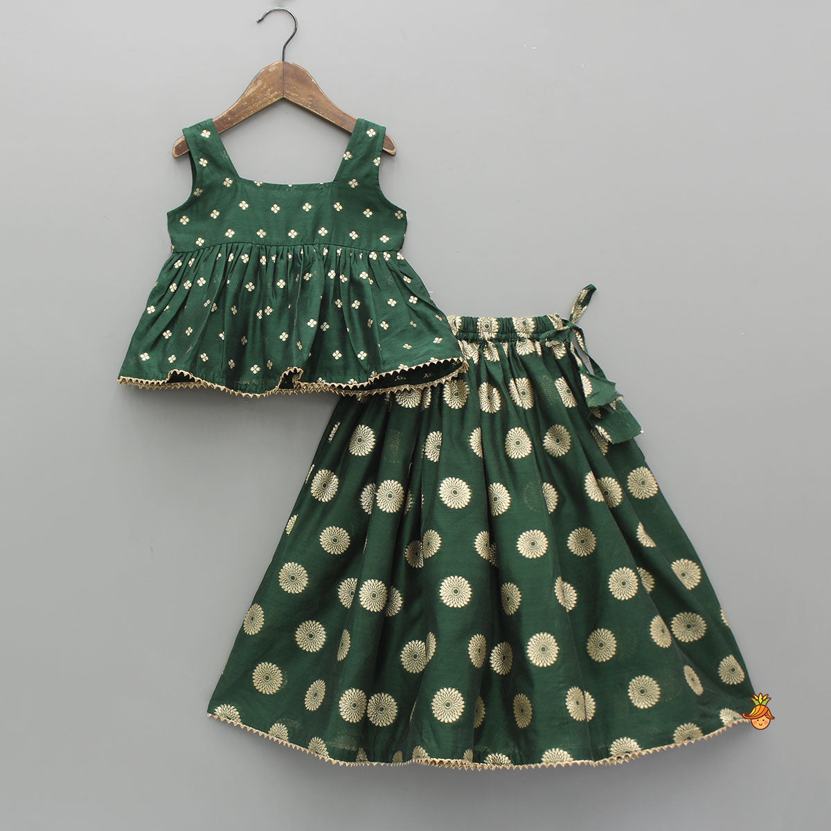 Embroidered Sleeveless Green Peplum Top And Lehenga