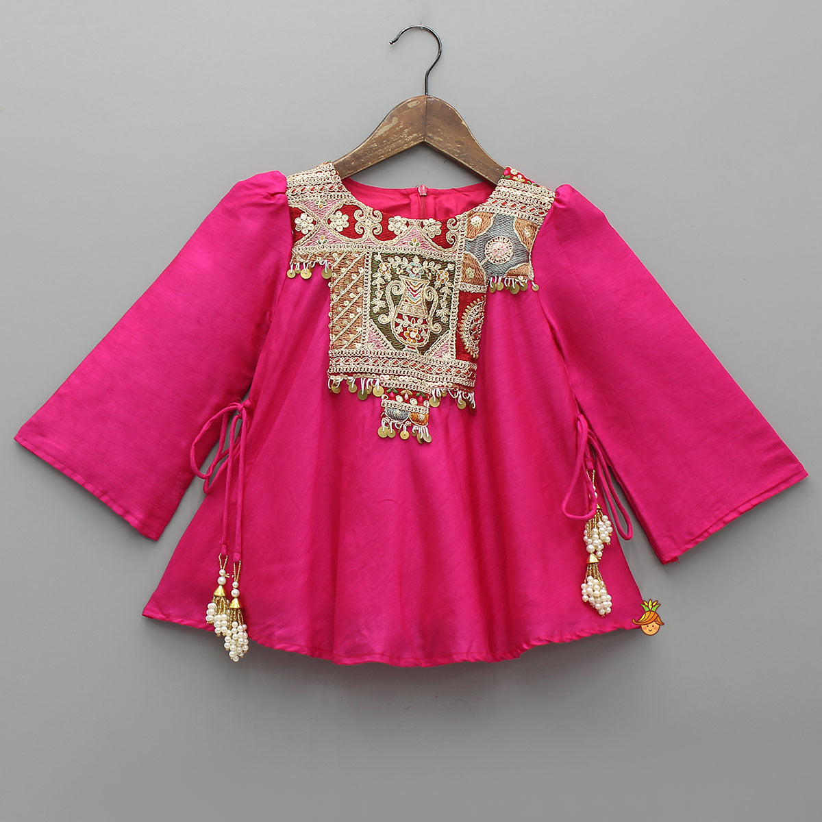 Embroidered Yoke Tassels Enhanced Pink Kurti And Dhoti