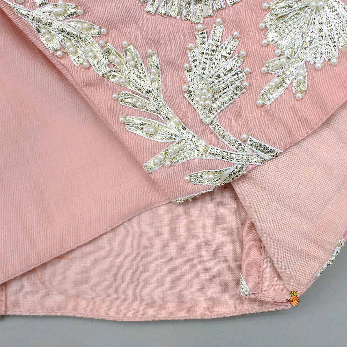 Gota Work Peach Ruffled Top And Tassels Enhanced Lehenga