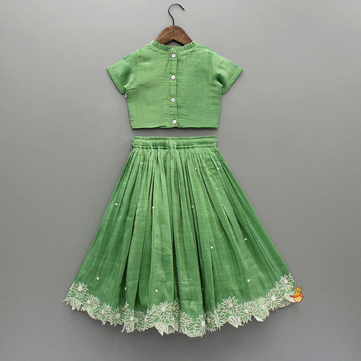 Pleated Neckline Green Shimmery Top And Fringes Tassels Enhanced Lehenga