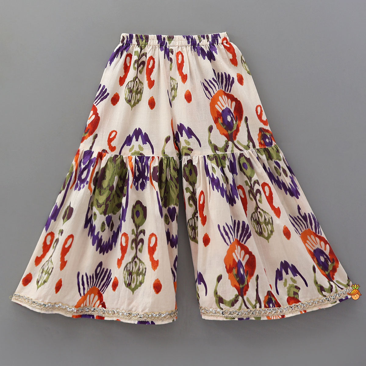 Tassels Enhanced Multicolour Printed Kurti And Sharara With Scalloped Lace Detail Dupatta