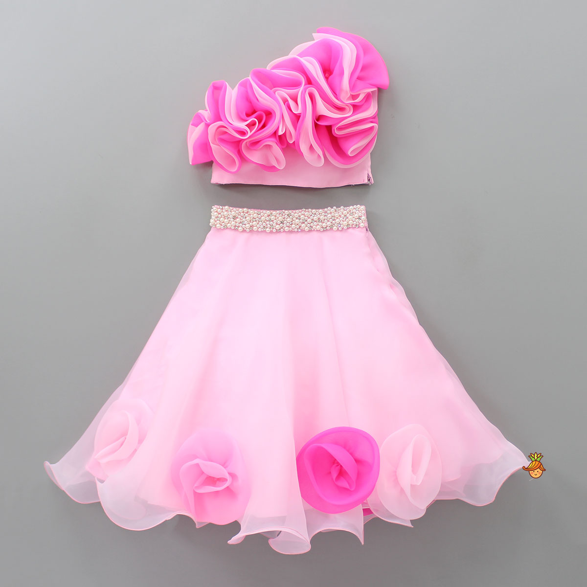 Pre Order: Organza One Shoulder Pink Top And Flower Adorned Flared Lehenga
