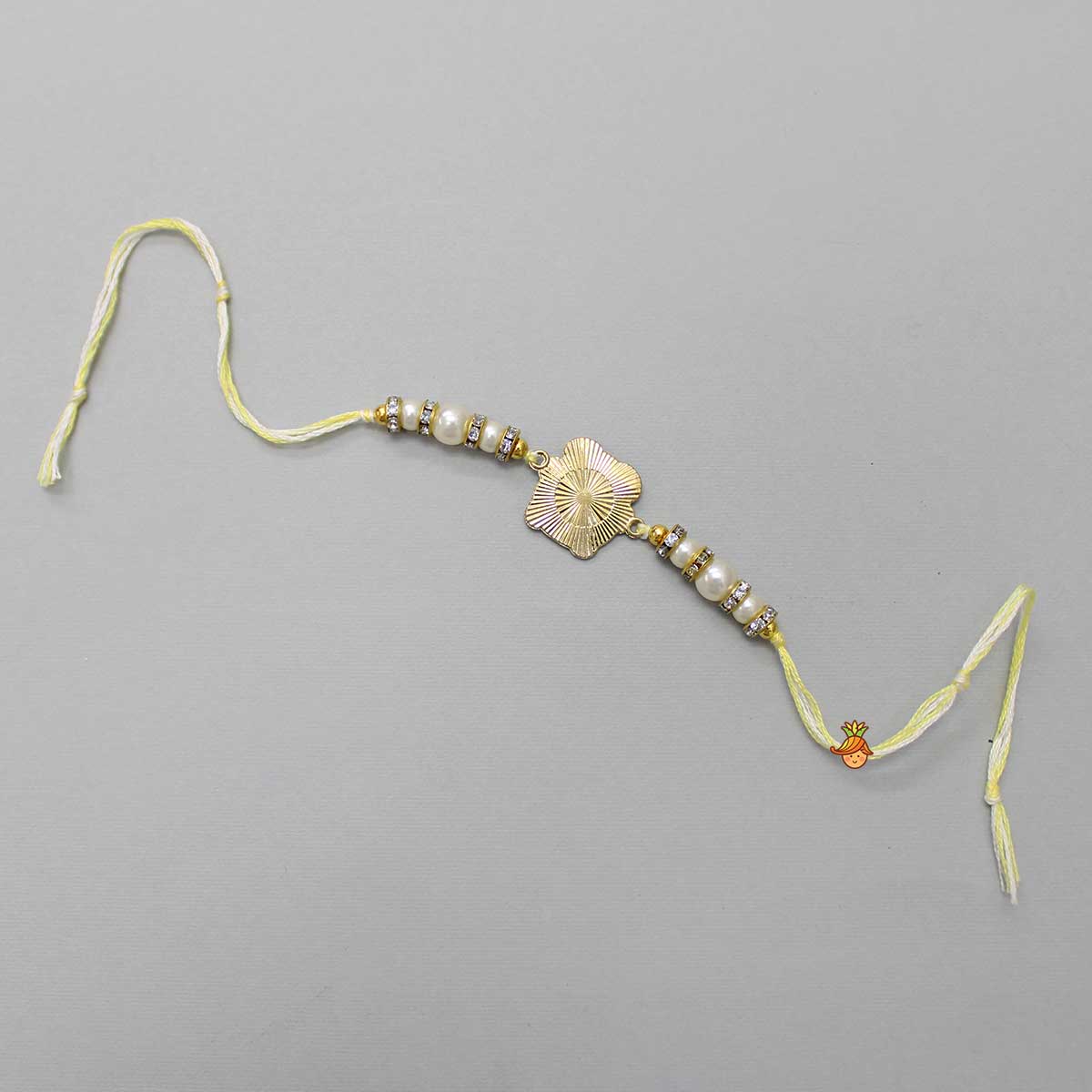Cute Yellow Metal Rakhi