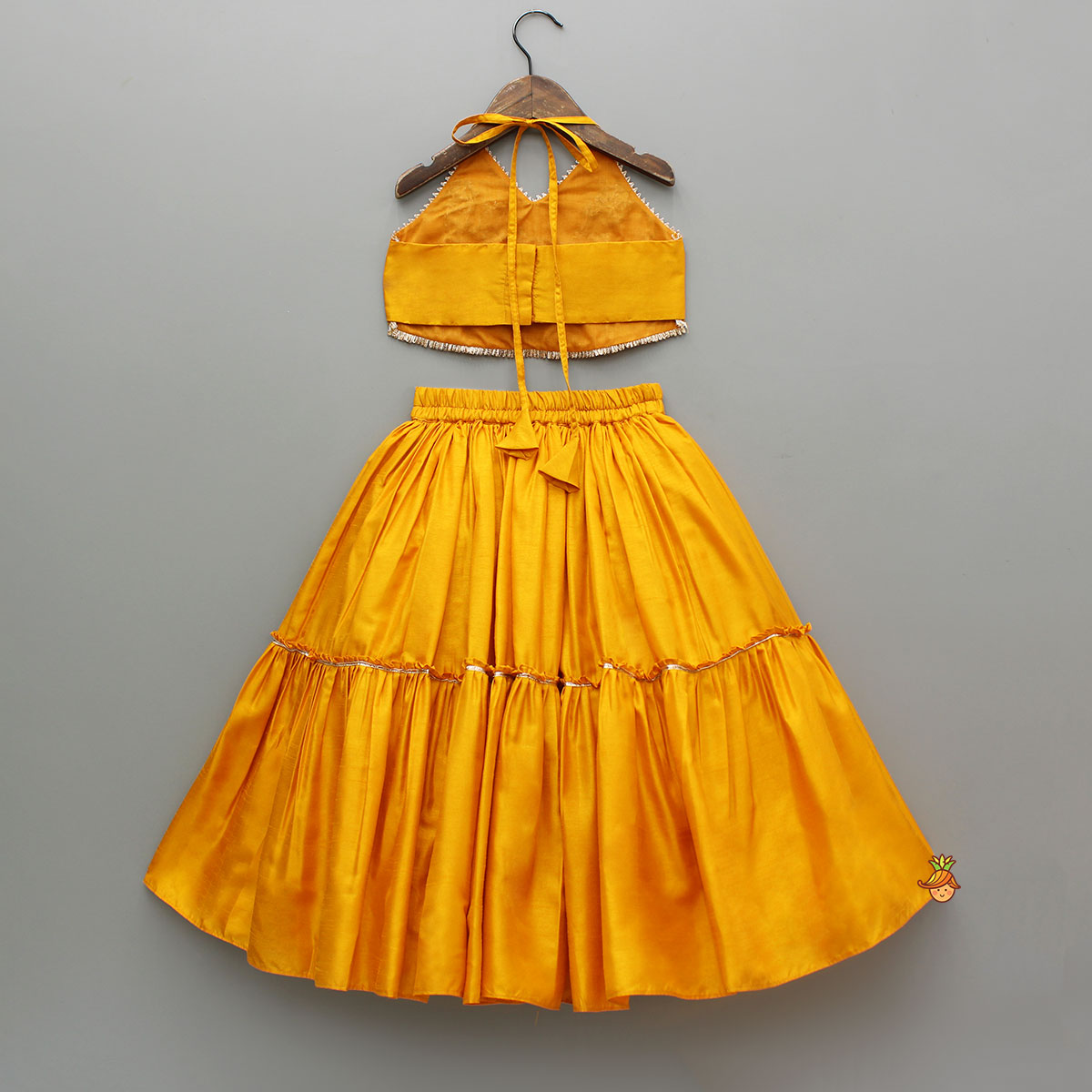 Beautiful Halter Neck Embroidered Mustard Top And Lehenga With Net Dupatta