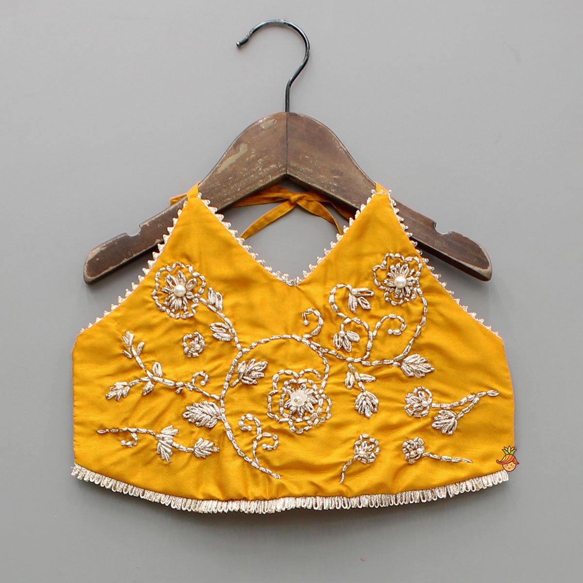 Beautiful Halter Neck Embroidered Mustard Top And Lehenga With Net Dupatta