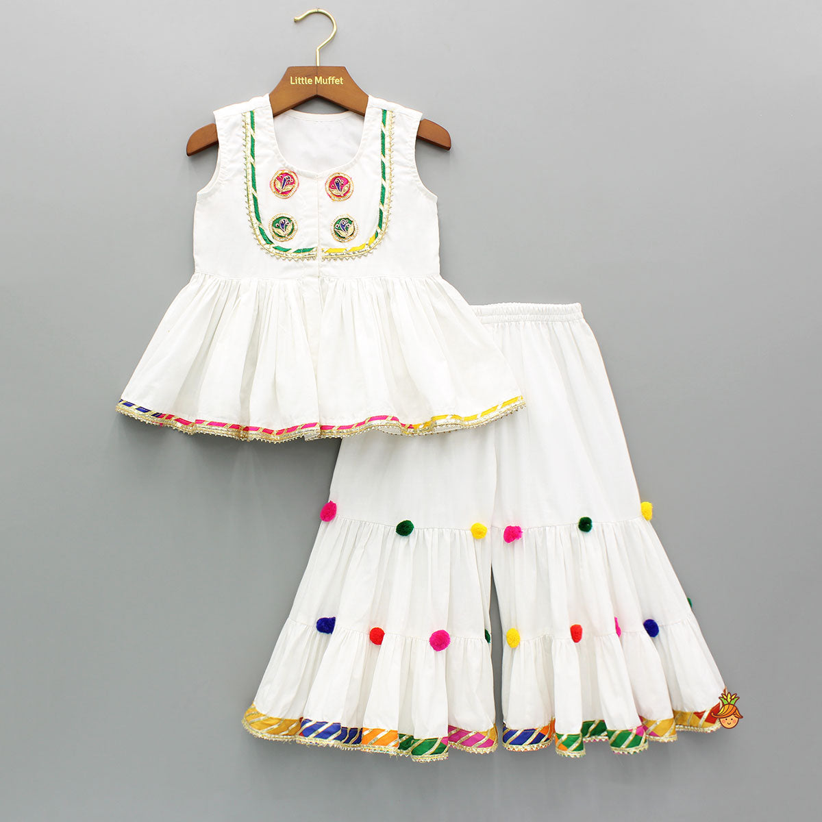 Front Slit White Top And Contrasting Pom Poms Adorned Sharara