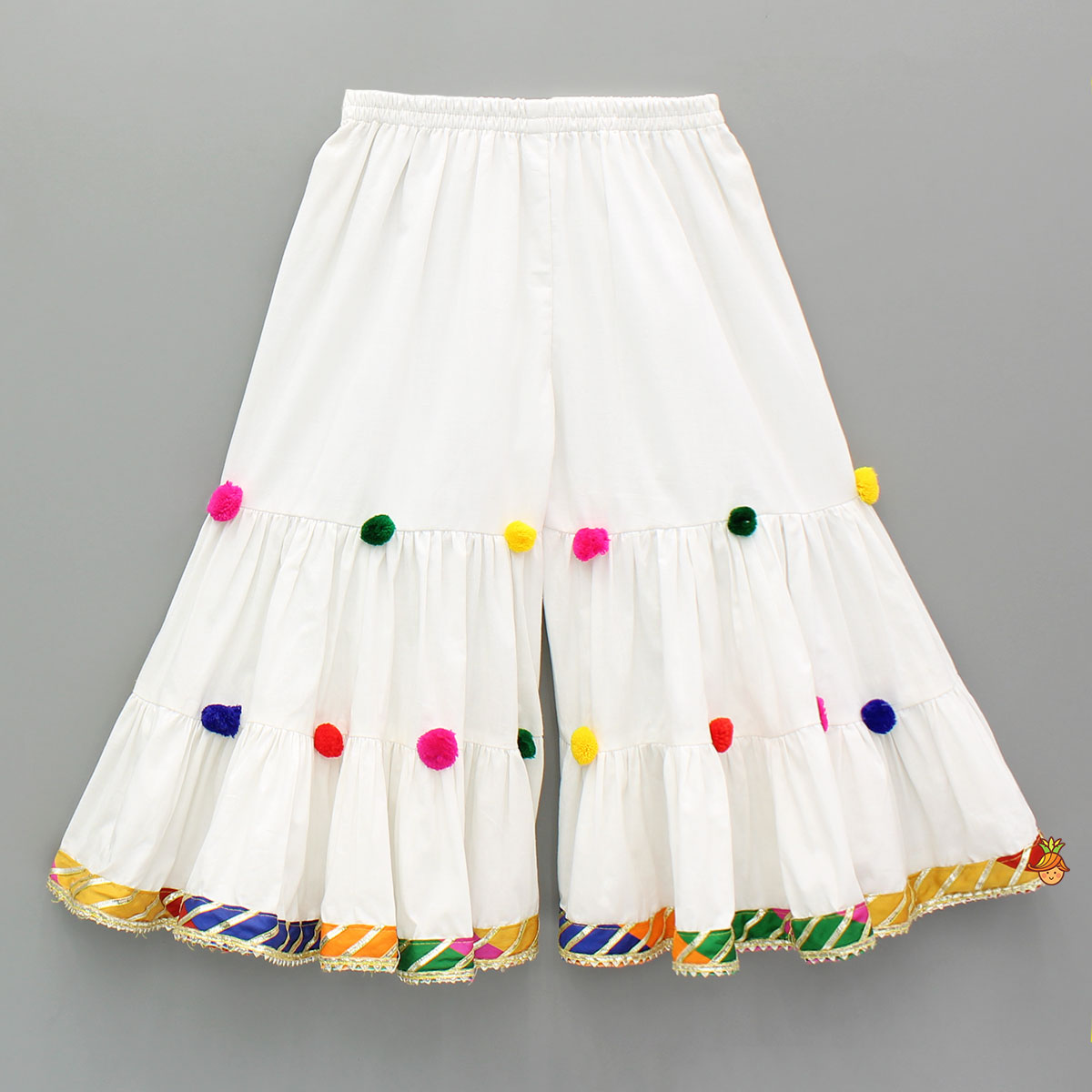 Front Slit White Top And Contrasting Pom Poms Adorned Sharara
