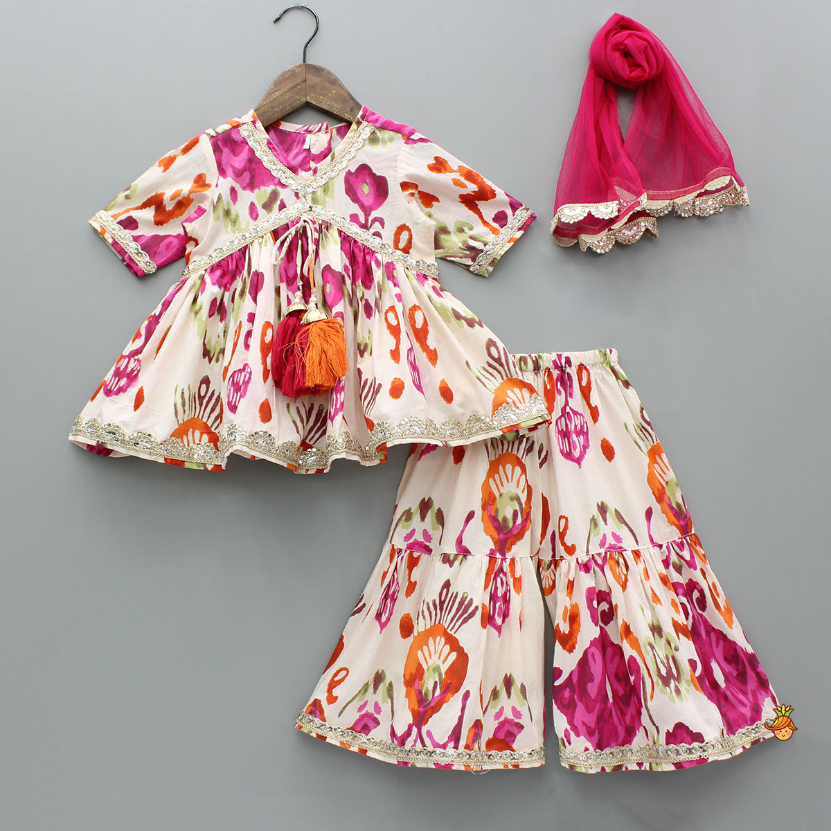 Tassels Enhanced Multicolour Printed Kurti And Sharara With Scalloped Lace Detail Pink Dupatta