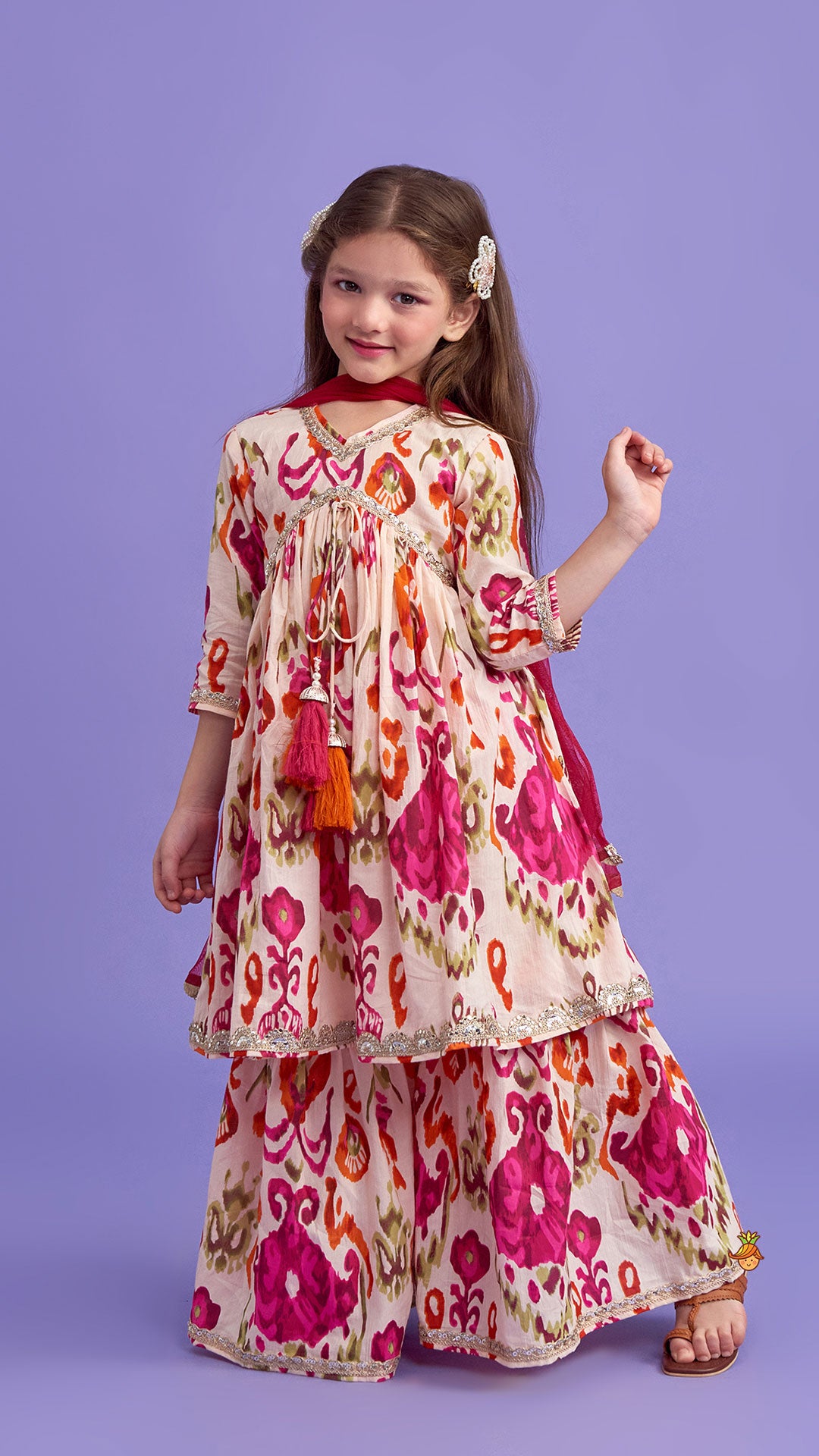 Tassels Enhanced Multicolour Printed Kurti And Sharara With Scalloped Lace Detail Dupatta