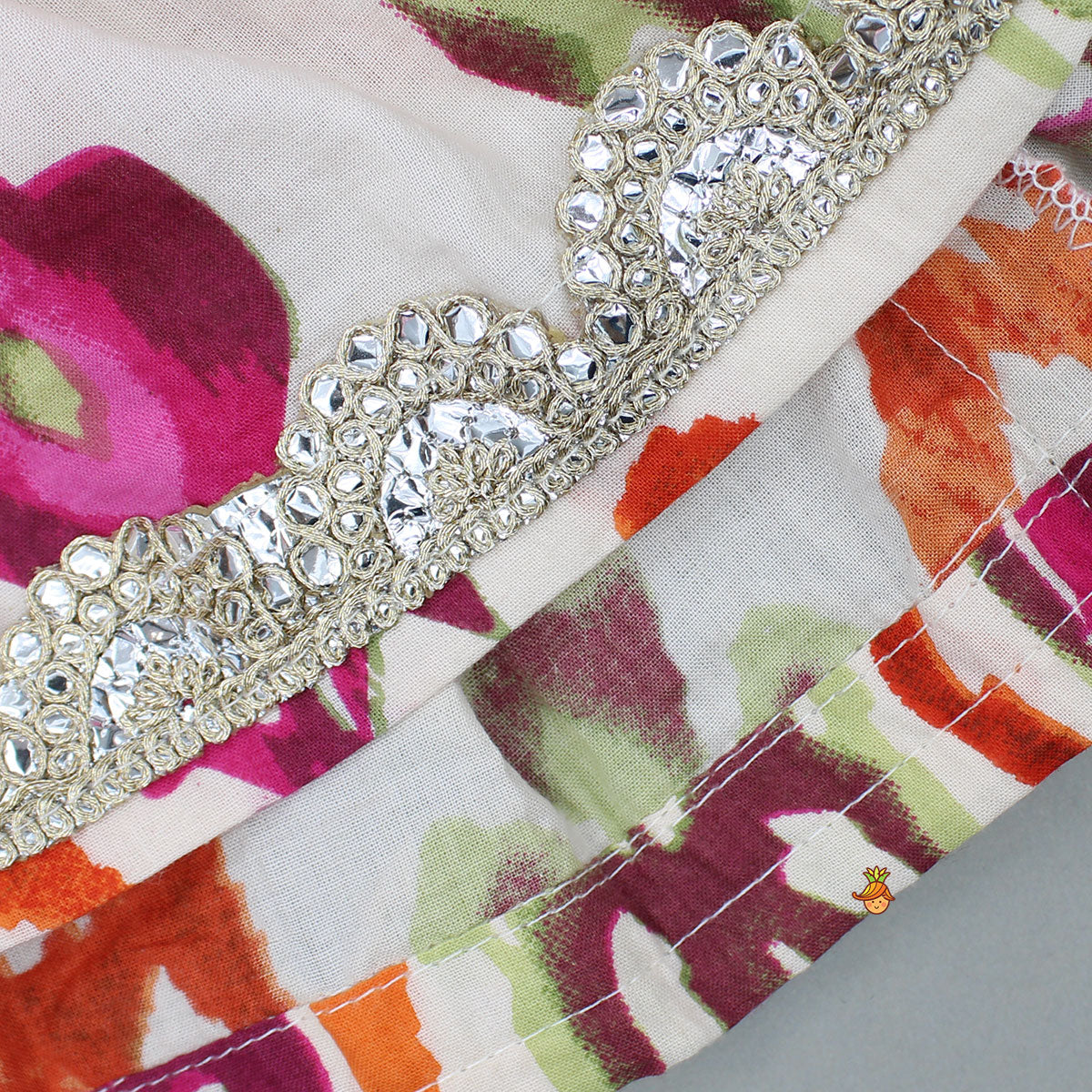 Tassels Enhanced Multicolour Printed Kurti And Sharara With Scalloped Lace Detail Pink Dupatta