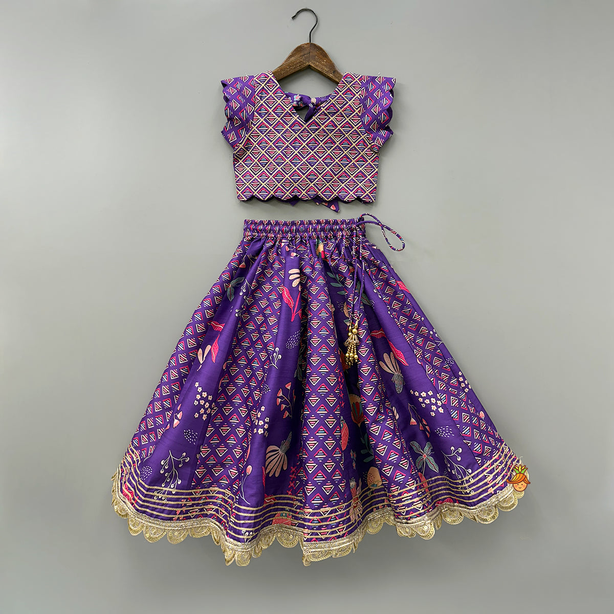 Scalloped Hem V Neck Purple Top And Lehenga With Matching Hair Band