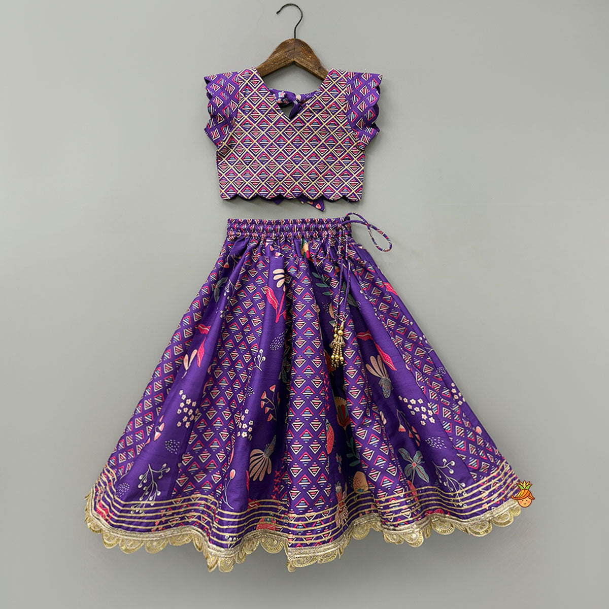 Scalloped Hem V Neck Purple Top And Lehenga With Matching Hair Band