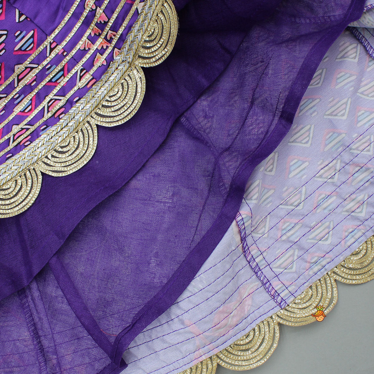 Scalloped Hem V Neck Purple Top And Lehenga With Matching Hair Band
