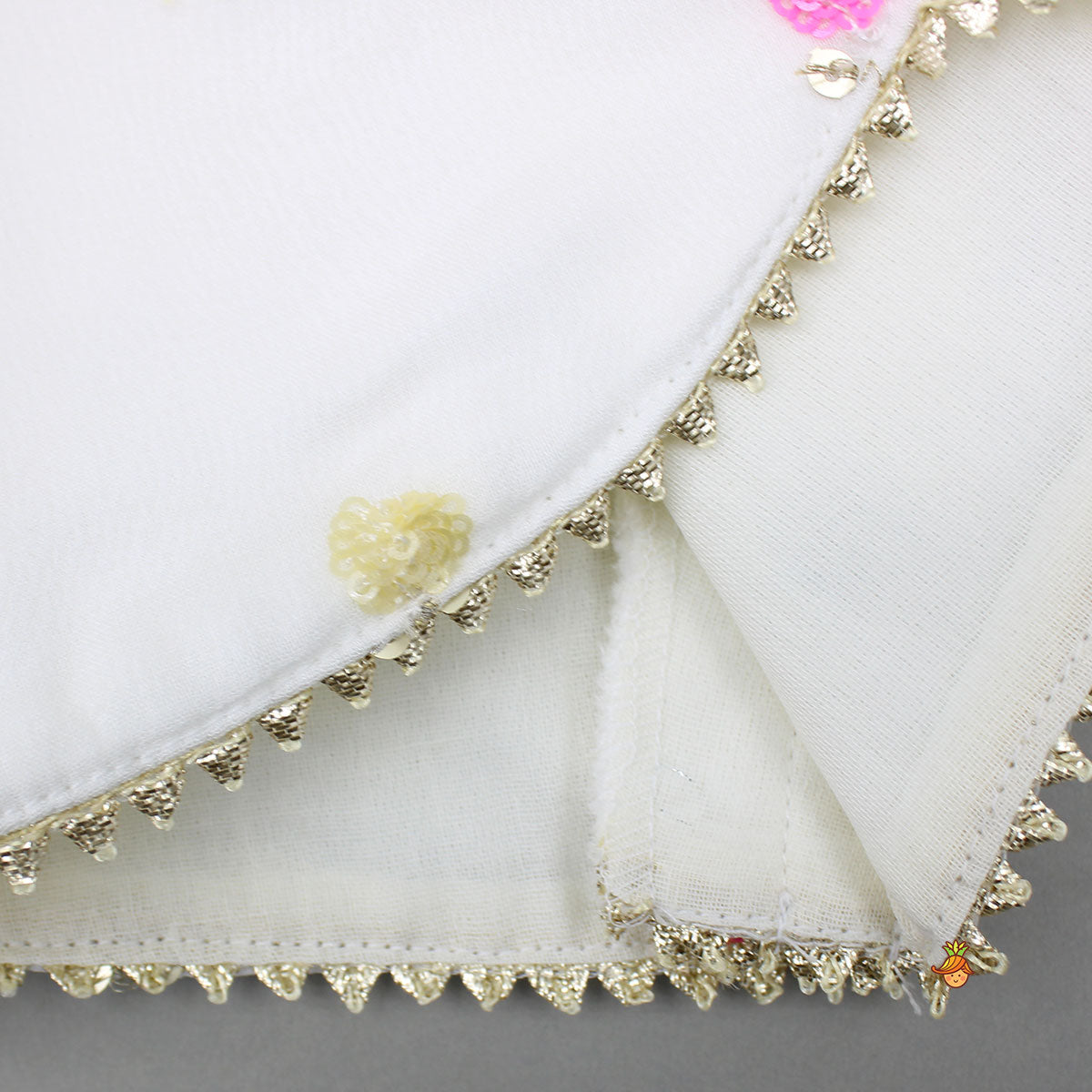 Embroidered Off-White Top And Lehenga With Contrasting Pink Net Dupatta And Potli Bag