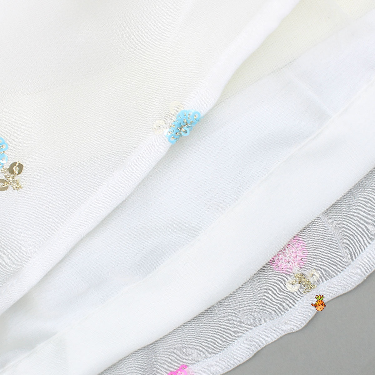Embroidered Off-White Top And Lehenga With Contrasting Pink Net Dupatta And Potli Bag