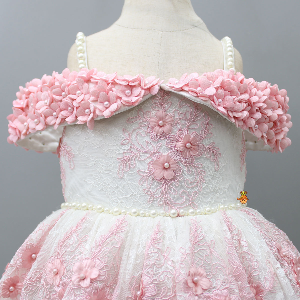 Off Shoulder Fabric Flowers Adorned Wings Gown With Detachable Trail And Matching Hair Clip