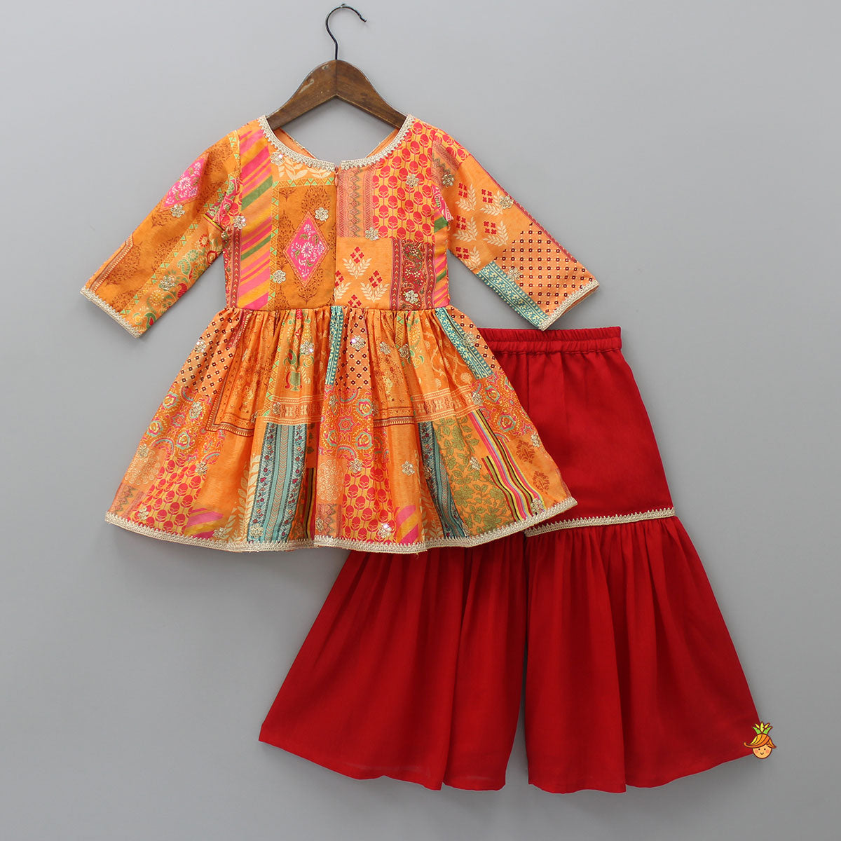 V Neck Multicolour Printed Kurti And Red Sharara With Matching Dupatta