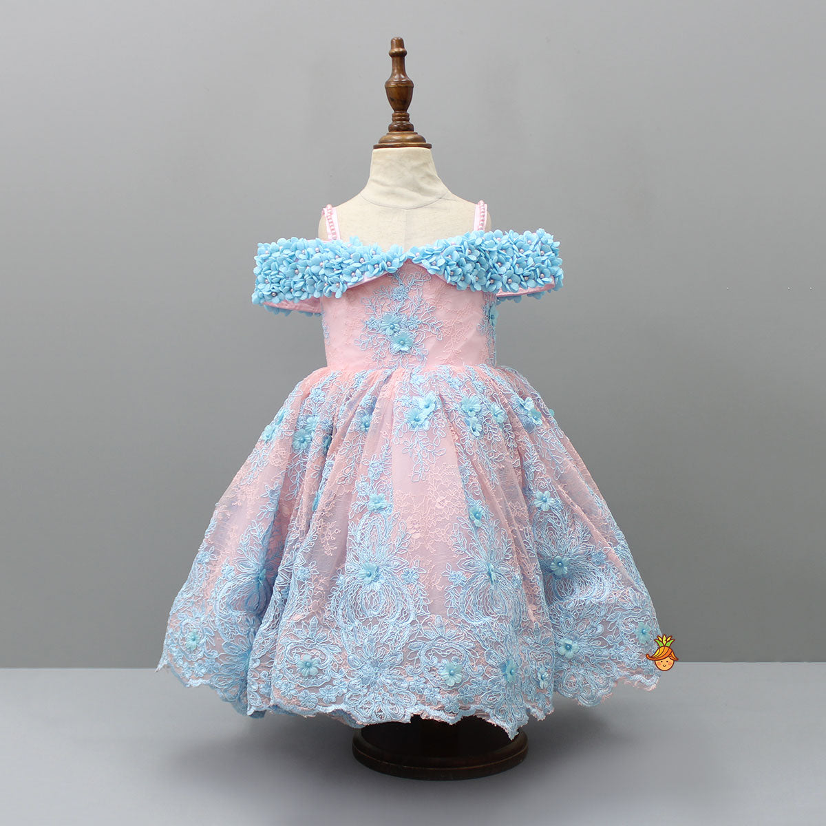 Off Shoulder Fabric Flowers Adorned Dual Tone Wings Gown With Detachable Trail And Matching Hair Clip