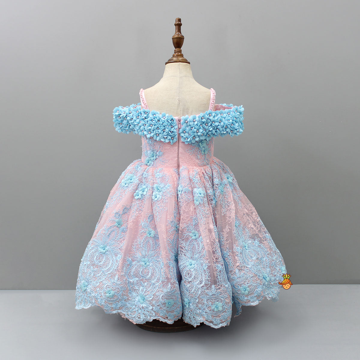 Off Shoulder Fabric Flowers Adorned Dual Tone Wings Gown With Detachable Trail And Matching Hair Clip