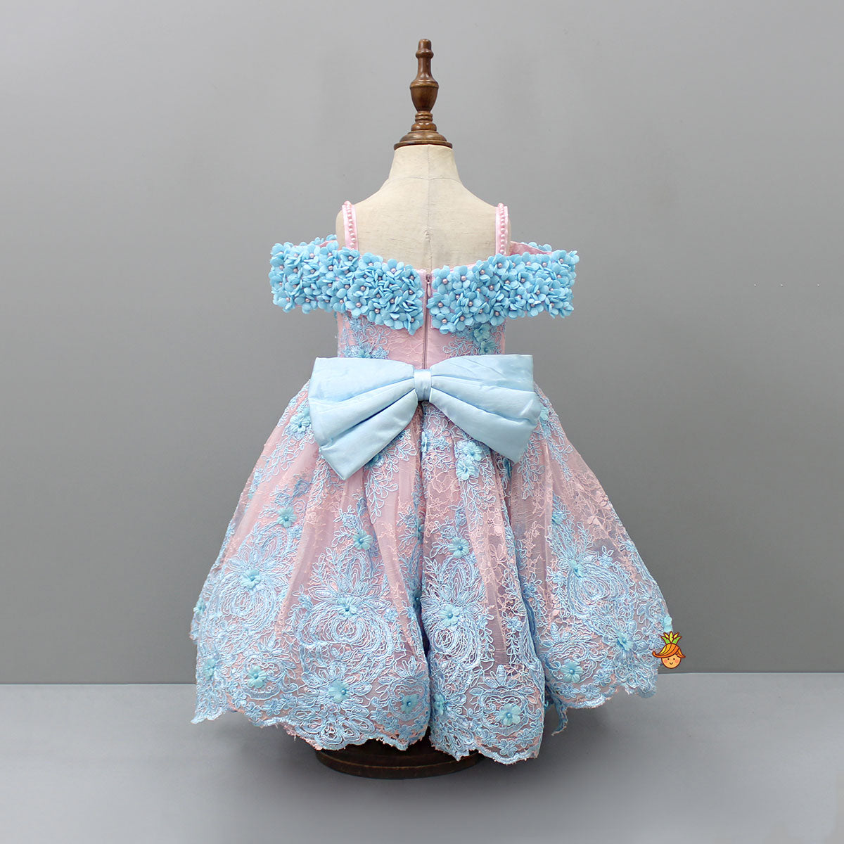 Off Shoulder Fabric Flowers Adorned Dual Tone Wings Gown With Detachable Trail And Matching Hair Clip