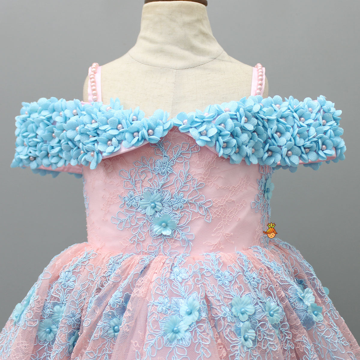 Off Shoulder Fabric Flowers Adorned Dual Tone Wings Gown With Detachable Trail And Matching Hair Clip