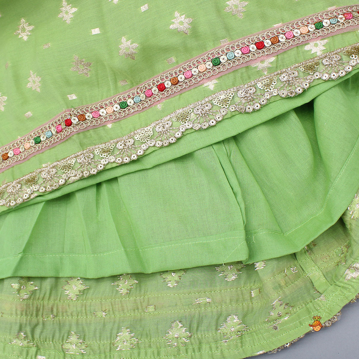 Pleated Hem Green Chanderi Embroidered Top And Lehenga With Net Dupatta