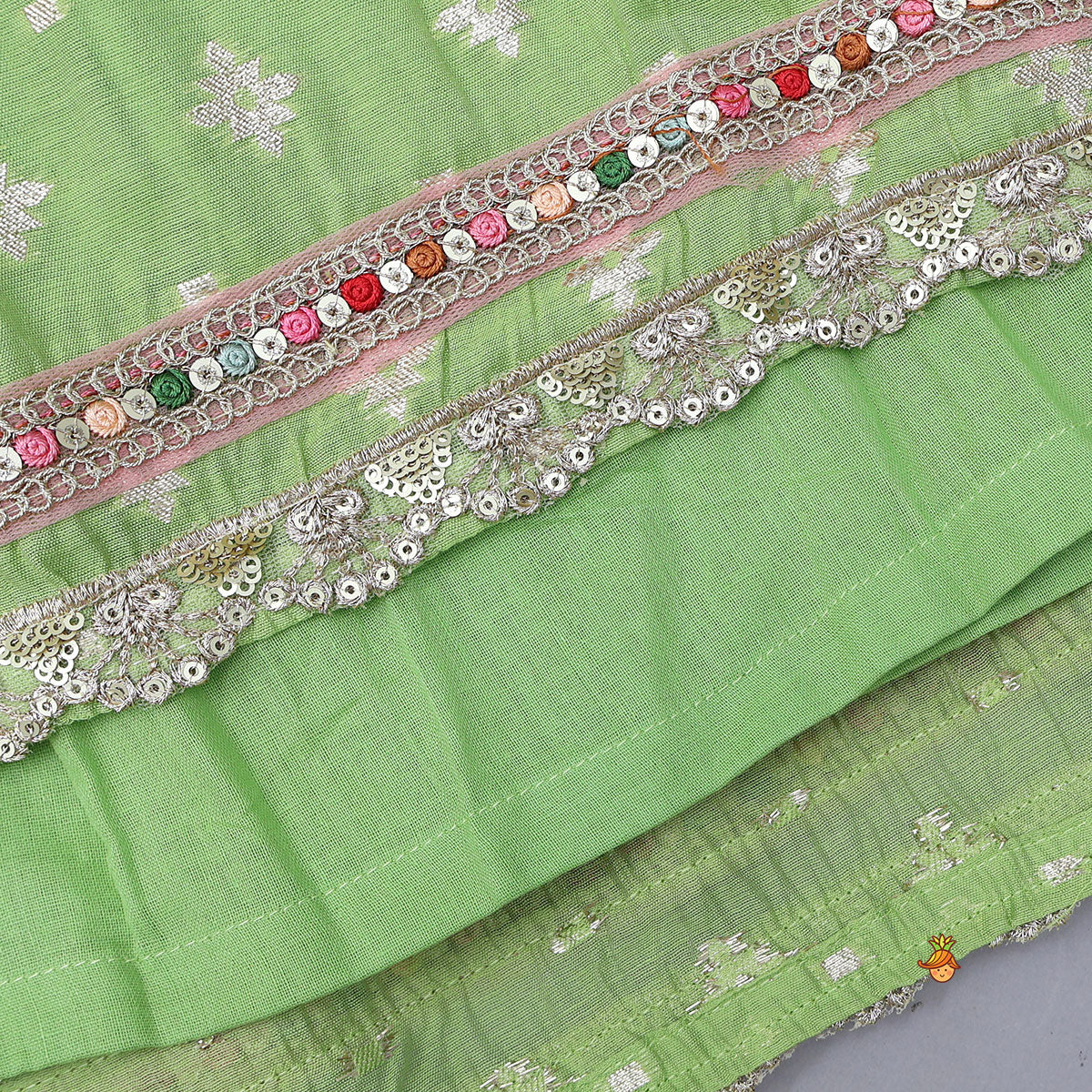 Pleated Hem Green Chanderi Embroidered Top And Lehenga With Net Dupatta