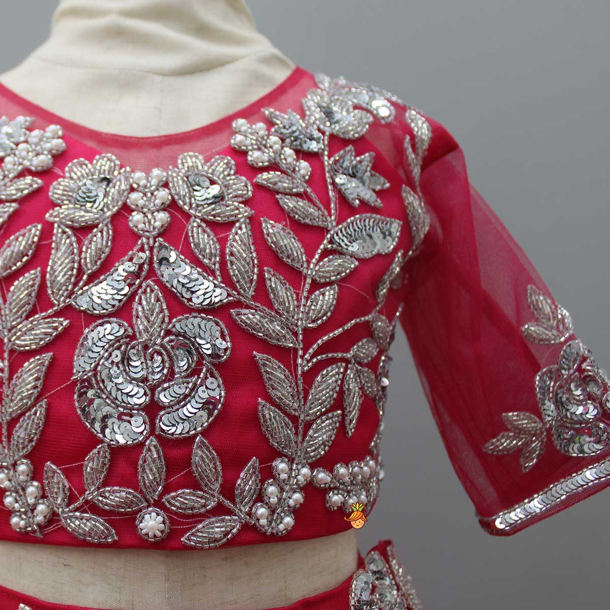 Pink Embroidered Crop Top And Net Layered Lehenga