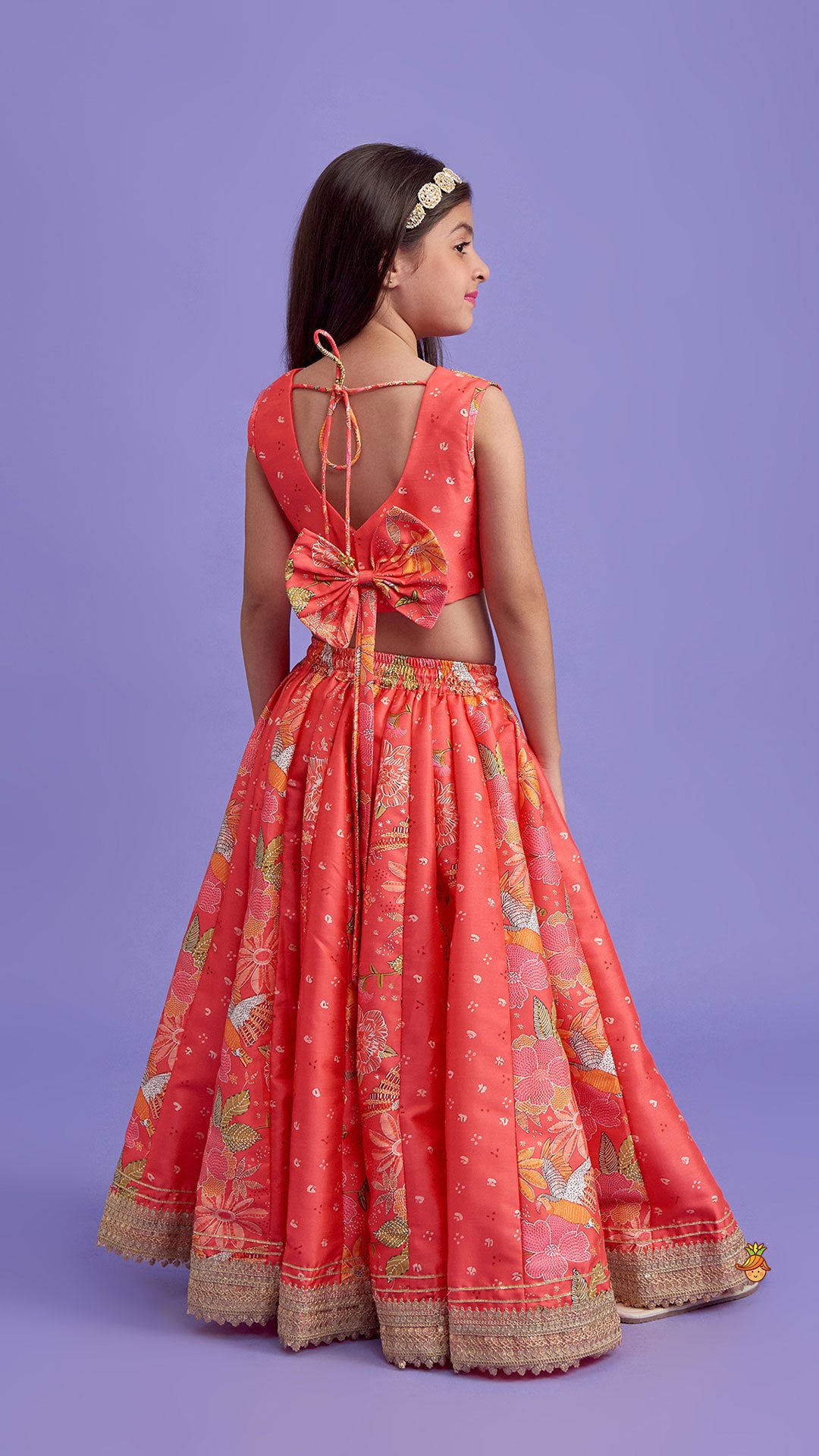 V Neck Peach Top And Printed Lehenga With Hair Band
