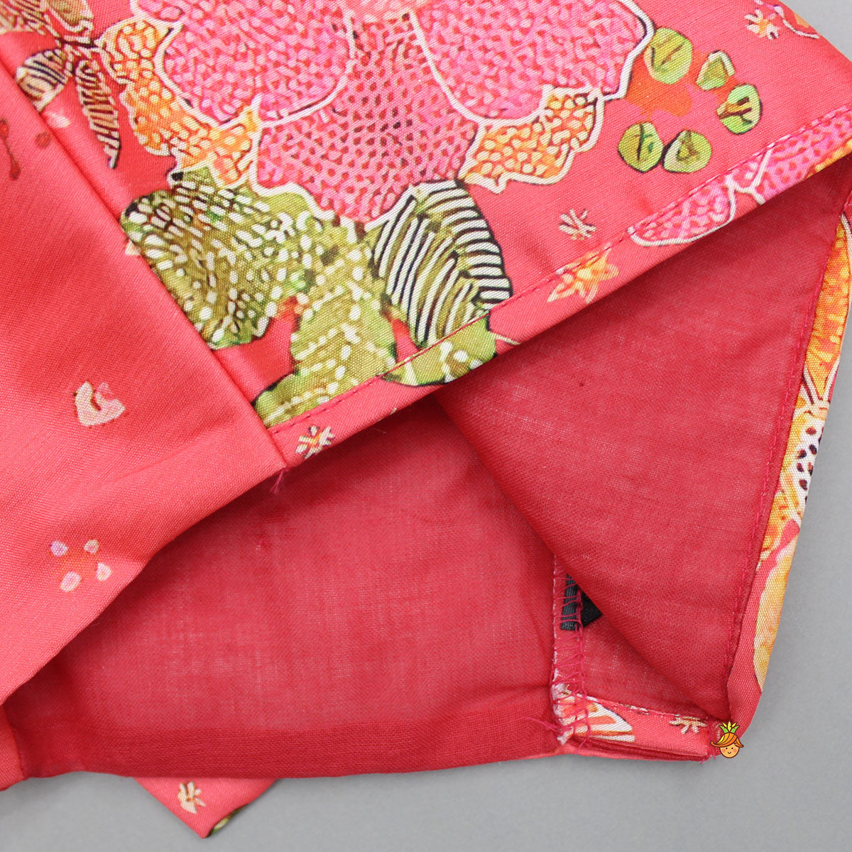 V Neck Peach Top And Printed Lehenga With Hair Band
