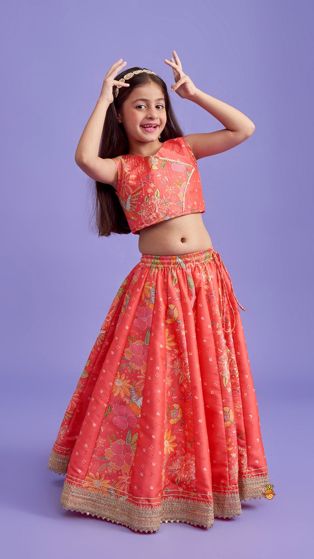 V Neck Peach Top And Printed Lehenga With Hair Band
