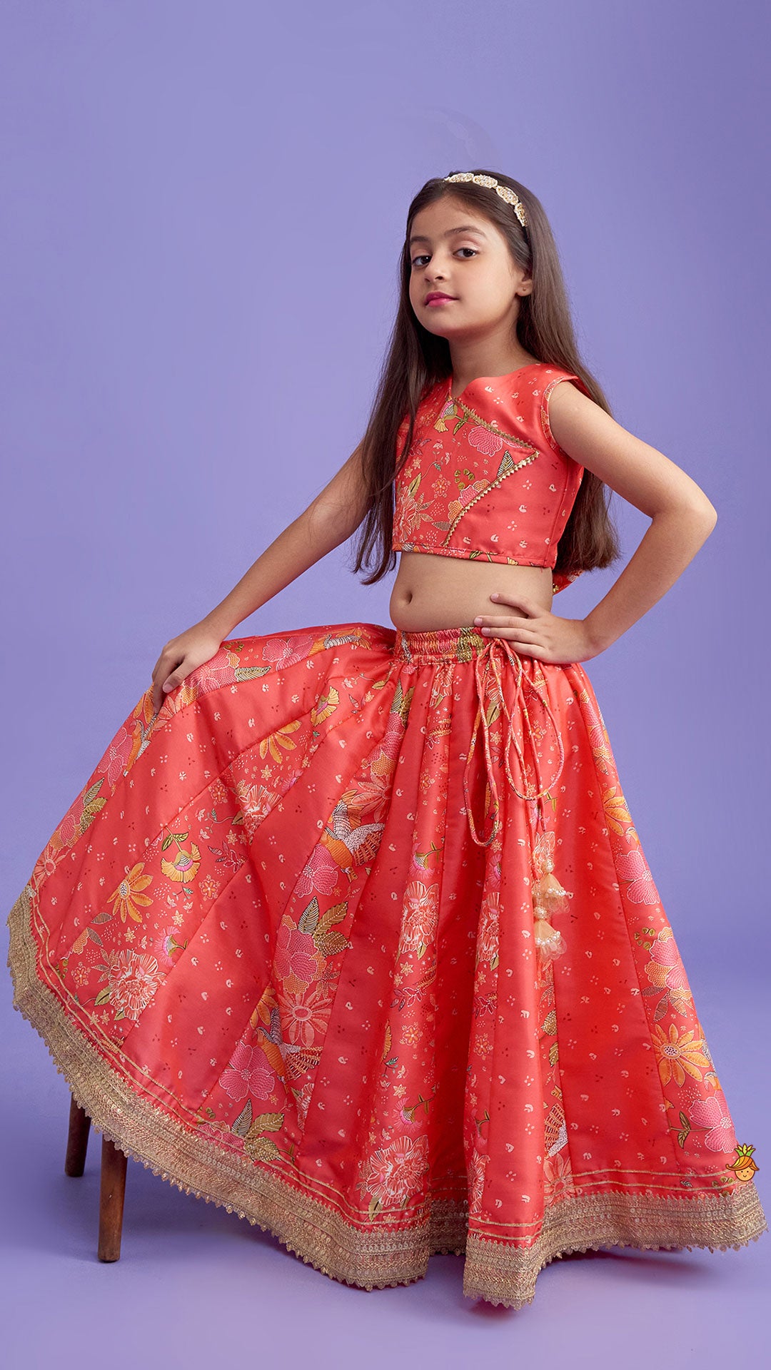 V Neck Peach Top And Printed Lehenga With Hair Band