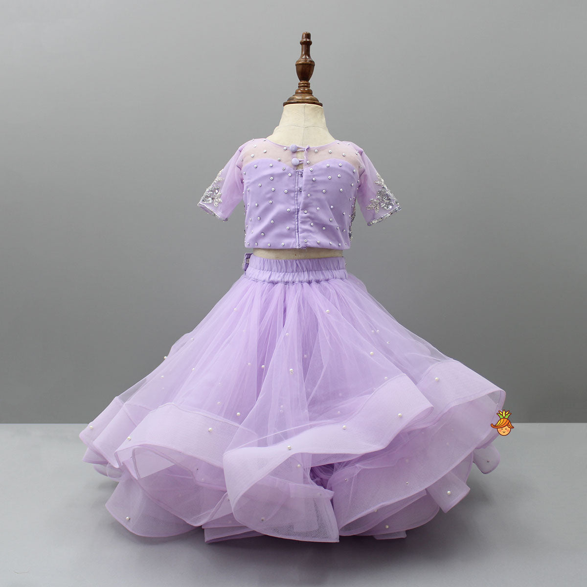 Lilac Embroidered Crop Top And Net Layered Lehenga