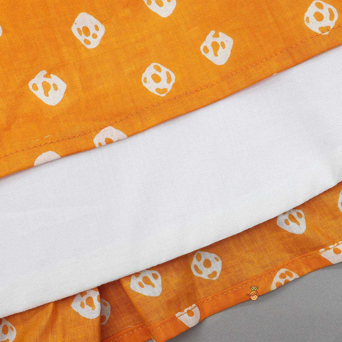 Orange Printed Kurti With Faux Mirror Work Flap