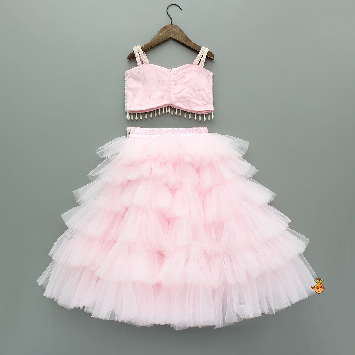 Pink Stylish Strappy Top And Ruffle Net Lehenga