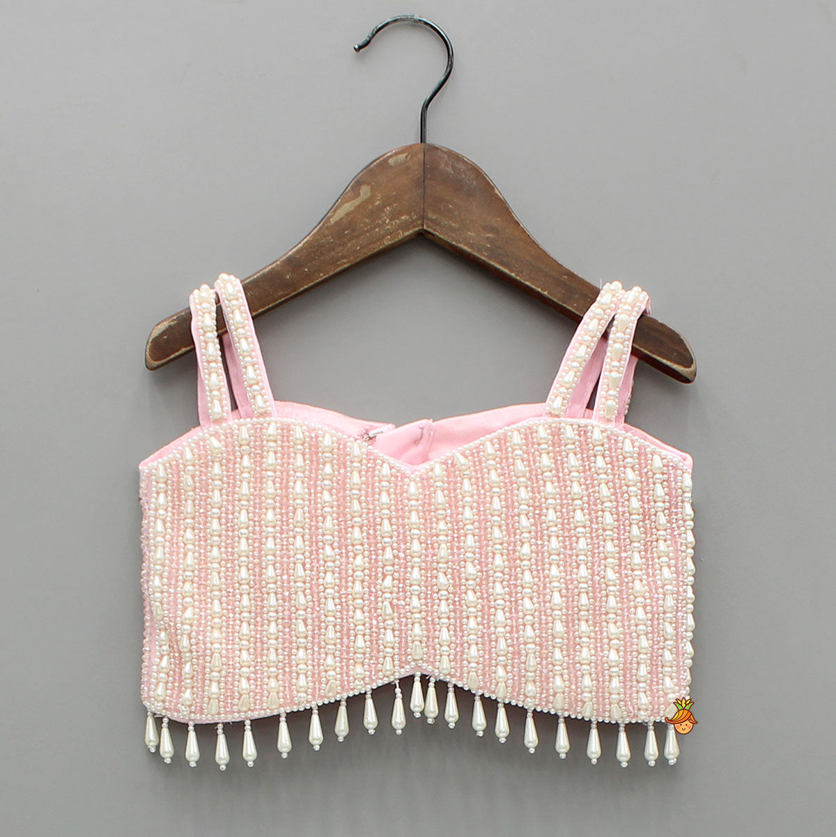 Pink Stylish Strappy Top And Ruffle Net Lehenga