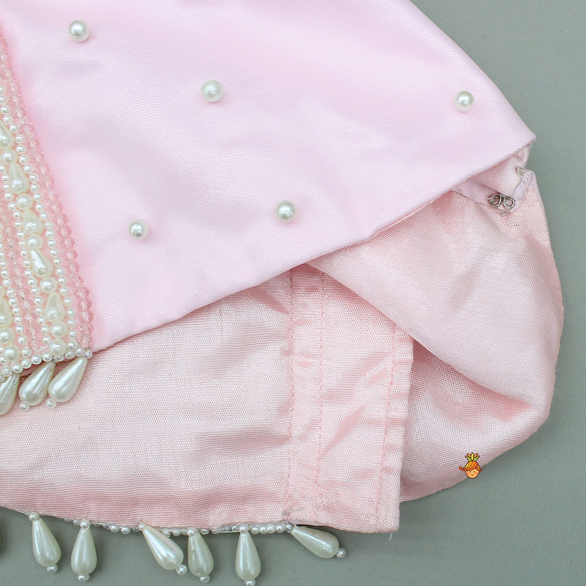 Pink Stylish Strappy Top And Ruffle Net Lehenga