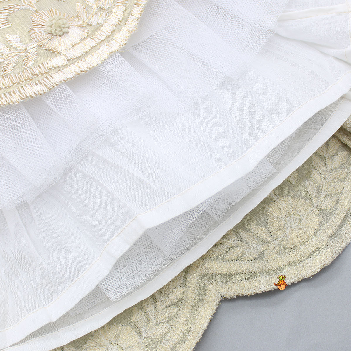 Embroidered Stylish Hem Beige Top And Pleated Lehenga