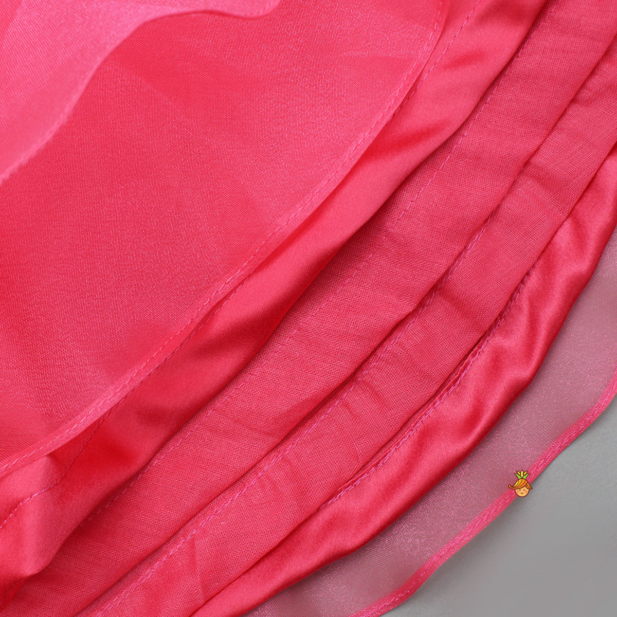 Flower Adorned Stylish Top And Asymmetrical Ruffle Lehenga