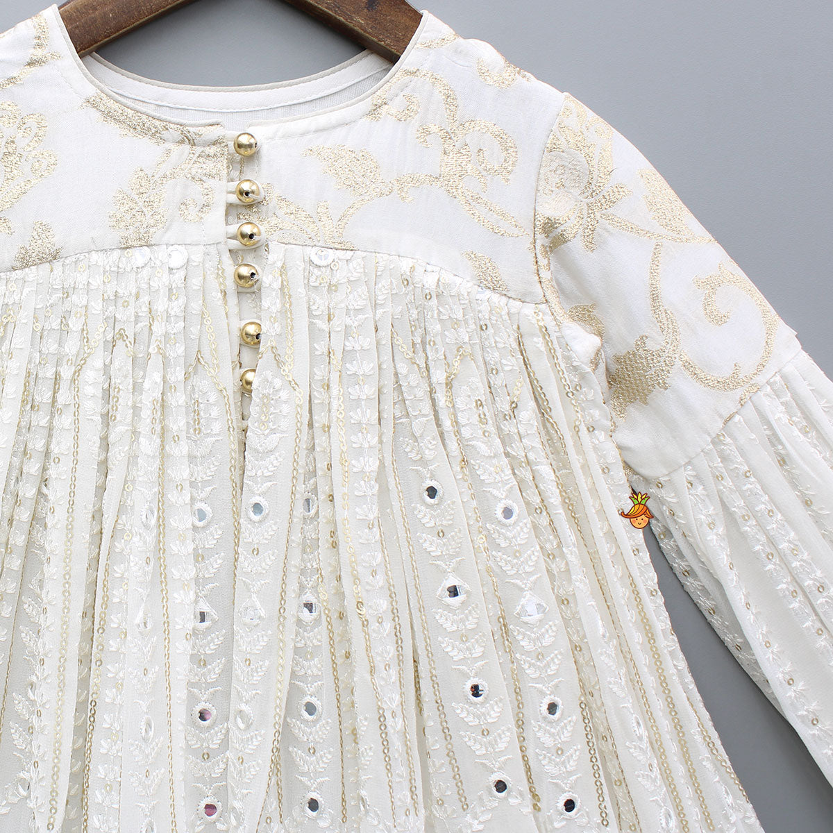 Off White Embroidered And Embellished Kurti