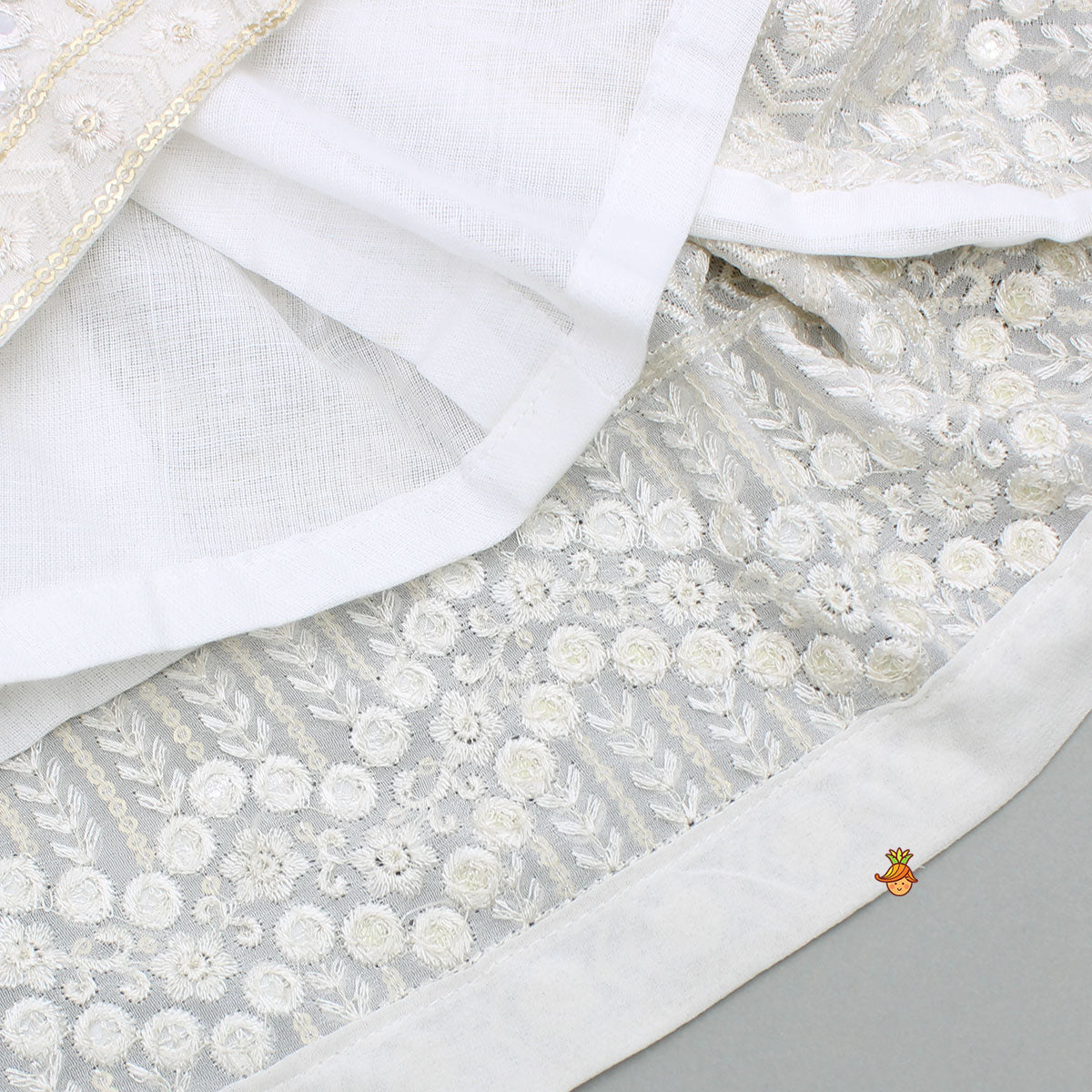 Off White Embroidered And Embellished Kurti