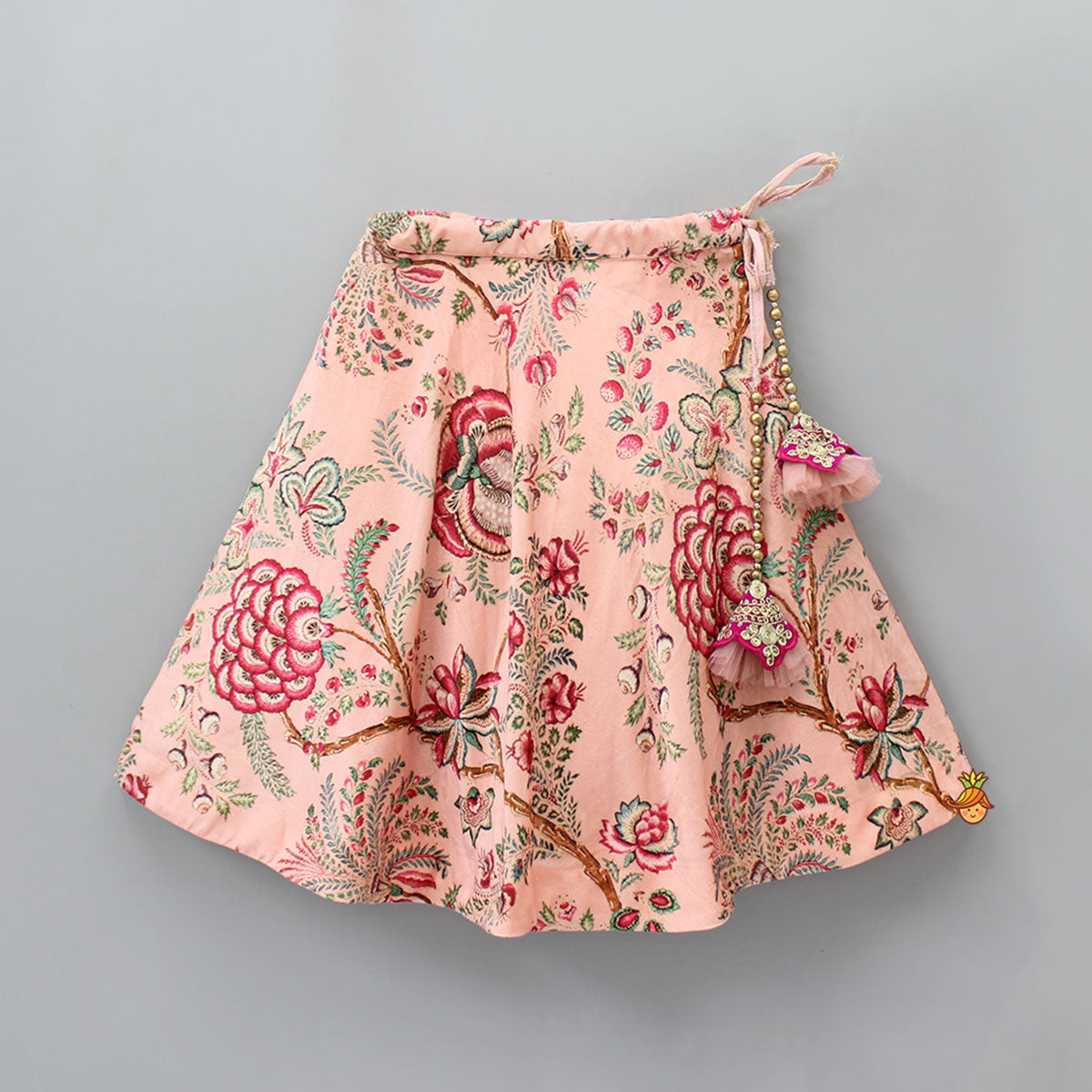 One Shoulder Embroidered Peach Velvet Top And Printed Lehenga